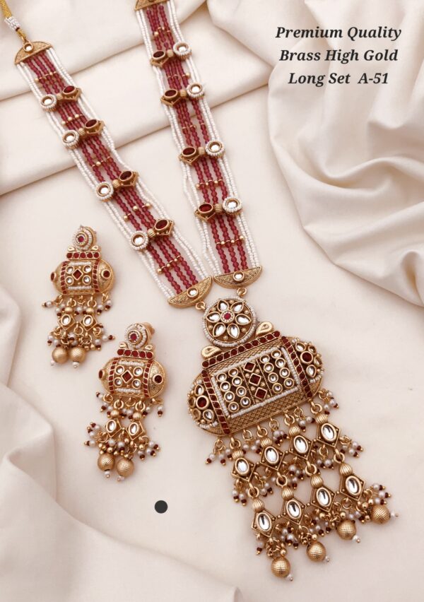 Long brass set with kundan work marron in colour